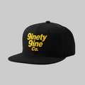 Black and yellow with the 9inety 9ine Co. Logo